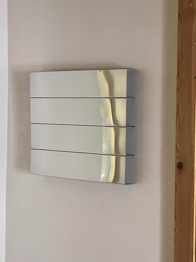 Sculpture Install on Custom Wall mount Sculpture Install on Custom Wall mount